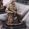Kneeling solider statue in full gear with gun, mounted on black base, MIL204 is 6" x 10" Size, Weighs 4.8 lbs.