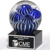 Glass sphere with Anemone Shapes in the middle on a black glass base, 2142, 3.5" x 5" Size