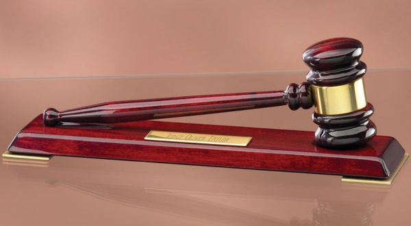 Rosewood gavel with gold gavel band sitting on rosewood display with engraving plate, GV138 is 12" x 3" Size, Weighs 2.2 lbs.