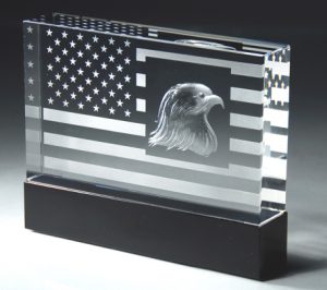 Crystal American flag with a bald eagle etched into it, mounted on black crystal base, CRY54 is 4.5" x 6" Size, Weighs 4 lbs