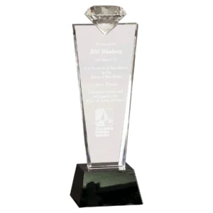 Our Crystal Diamond Top Trophy has a diamond on the top of the trophy and a large engraving area for personalization. The CRY3211C is mounted on a black base and comes in a satin lined deluxe gift box.
