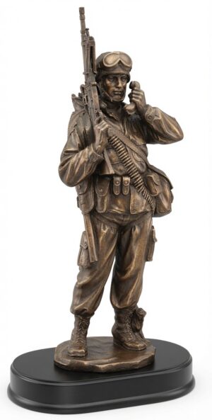 Military Communications Statue MIL202 - Detailed bronze-finished electroplated resin figure of a standing soldier in full combat gear, holding a rifle in one hand while communicating on a radio handset with the other. Features helmet with goggles, tactical vest, ammunition belt, and focused expression. Mounted on a sleek black base with engraving plate, this 6" x 14" military award honors signal specialists, communicators, and dedicated service members. Perfect for personalized military recognitions, retirements, and veteran gifts.