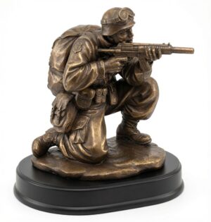 Soldier Shooting Statue MIL203 - Detailed bronze-finished electroplated resin figure of a soldier in a dynamic kneeling combat position, aiming and firing a rifle. Features full tactical gear, helmet with goggles, backpack, and realistic uniform details. Mounted on a sleek black base with engraving plate, this 5" x 9" military recognition trophy honors bravery, combat readiness, and dedicated service. Perfect for personalized awards, retirements, and veteran gifts with free engraving.