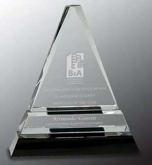 Our Crystal Triangle Trophy features 3 tiers, the first two are clear crystal and the bottom base is black crystal. The larger main area is for laser engraving personalization, the smaller middle area can also be personalized as well. This CRY168M crystal triangle trophy is 5.5" x 6.5" in size, weighs 2.5 lbs & is packaged in deluxe gift box.