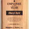 A wood plaque made with red alder wood. The plaque is 3/4" thick. The engraving is for the Employee of the Year at Higgins & Sons business.