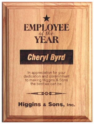 A wood plaque made with red alder wood. The plaque is 3/4" thick. The engraving is for the Employee of the Year at Higgins & Sons business.