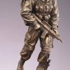 Military Patrol Statue shows solider patrolling with gun in hand, MIL198 is 5" x 13" Size, Weighs 3 lbs.