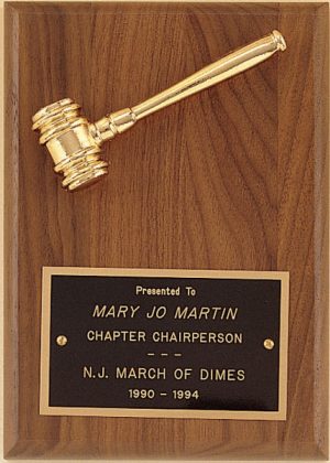 A 5" x 7" walnut board with a gold tone gavel at the top and a black brass engraving plate at the bottom. The engraving plate has words of recognition for the Chapter Chairperson of the New Jersey March of Dimes organization.