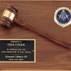 A solid American walnut wood board. On the walnut plaque is a walnut gavel, black engraving plate & an activity insert. The activity insert on this photo features the Freemason logo.