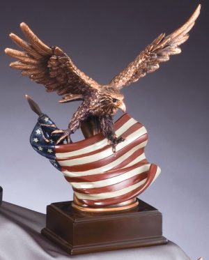 Bronze eagle statue with American flag, mounted on wood base, RFB138 is 10" x 12" Size, Weighs 5.5 lbs.