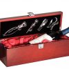 A rosewood wine box that is coated with piano finish and has silver latches & hinges. The inside of the box is lined with red satin & holds a bottle of wine. The top of the lid features wine tools such as a corkscrew, stopper, decanting pourer & plastic foil cutter.