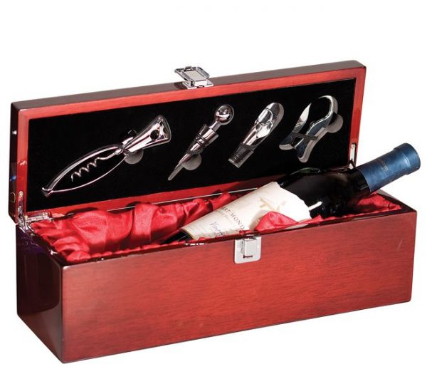 A rosewood wine box that is coated with piano finish and has silver latches & hinges. The inside of the box is lined with red satin & holds a bottle of wine. The top of the lid features wine tools such as a corkscrew, stopper, decanting pourer & plastic foil cutter.