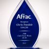 A blue acrylic award in the shape of a flame. It has engraving on the blue middle part with a logo & text and the base is blue acrylic as well.