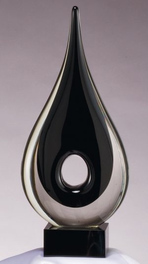 Black Raindrop Glass Art Sculpture GLSC32, Raindrop shaped piece of glass with hole in middle, mounted on a black base