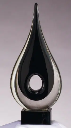 Black Raindrop Glass Art Sculpture GLSC32, Raindrop shaped piece of glass with hole in middle, mounted on a black base