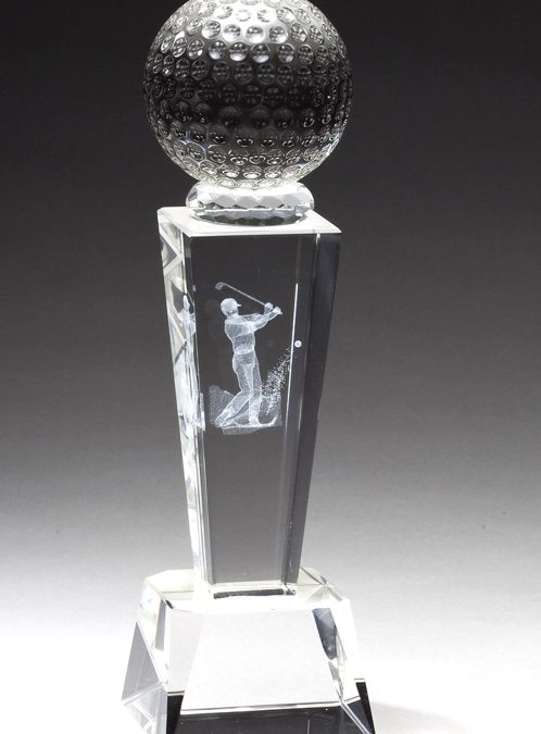 A golf trophy featuring a solid crystal golf ball at the top, a laser engraved 3D golfer swinging his club in the middle & a clear crystal base at the bottom.