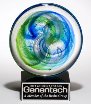 2107 Art Glass Disk Award, Round glass disk with blue & green colors inside mounted on a black glass base