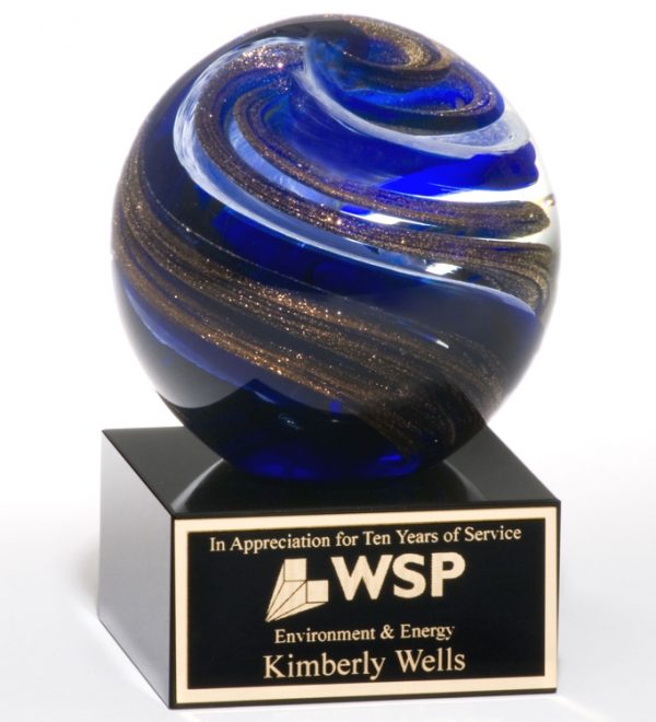 2123 Globe Art Glass Award, Glass sphere with blue & gold colors throughout mounted on a black glass base