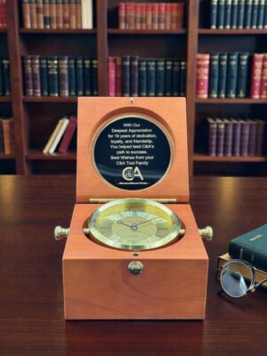 Captain’s Clock is made from hand rubbed, mahogany finish case with solid brass clock housing and a black brass plate for engraving. The BC73 is 5.5" by 5.5".