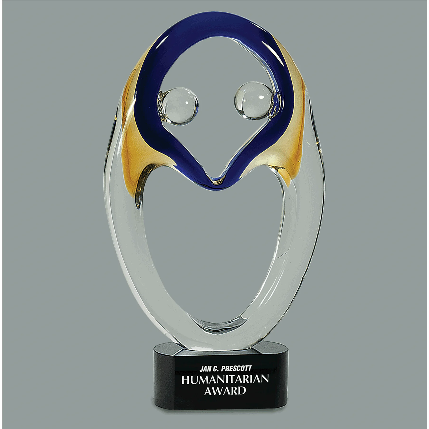 Our Together Art Glass Award is blue, yellow & clear. The AGS16 stands 13.75" tall and comes in the satin lined deluxe gift box.