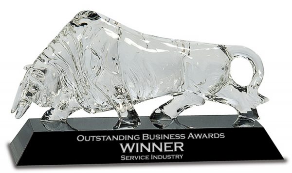 Clear crystal bull with horns in the front & tail in back, Mounted on black glass crystal base, CRY301, 7" tall, Weighs 18 lbs