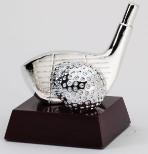 A golf trophy featuring a silver golf driver head & silver golf ball mounted on a dark wood base.