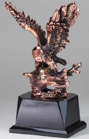 Bronze eagle statue with a bronze American flag, mounted on black base, AE270 is 6.5" x 10.5" Size