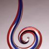 Hook shaped glass art award with red & blue colors, mounted on clear glass base, glsc1 is 14.5" tall, weighs 7.5 lbs