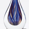 Glass teardrop with blue & gold colors throughout, Mounted on black glass base, GLSC45, 7" tall