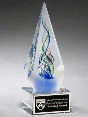 2264 Arrow Glass Art Award, Arrow shaped glass with red, blue & green inside on a clear glass base with black engraving plate