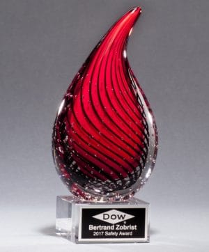 Red raindrop art glass award with black line accents, mounted on clear glass base, 2249 is 7.5" tall, weighs 3.8 lbs