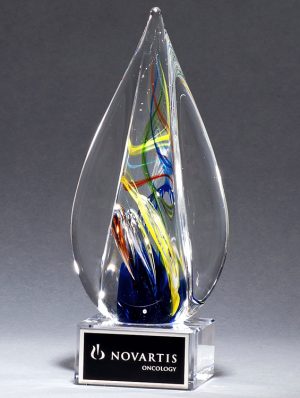 Pointed spire piece of glass with streaks of color throughout, Mounted on clear glass base, 2261, 7.25" tall