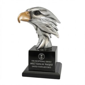 Silver Eagle Head Bust (EGL79) on black base, 7.25" tall. Features U.S. Air Force award plate: "FOR EXCEPTIONAL SERVICE, MSGT ELENA M. VASQUEZ, UNITED STATES AIR FORCE."