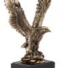 Gold eagle statue with the eagle in flight, mounted on black base, RFB525 is 14.75" tall, Weighs