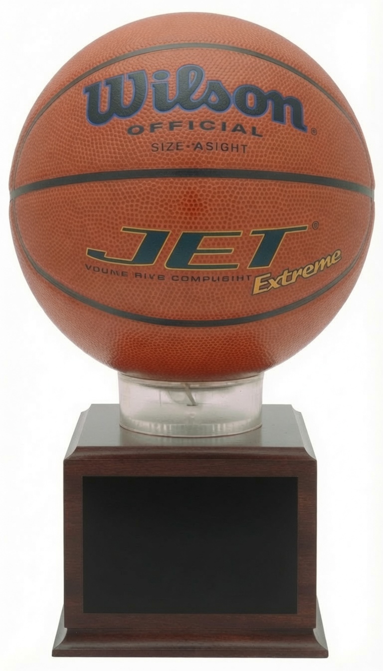 A premium acrylic basketball display case with a clear protective dome showcasing an official Wilson Jet basketball on a crystal riser and walnut base. This elegant trophy case is perfect for preserving and displaying championship basketballs.