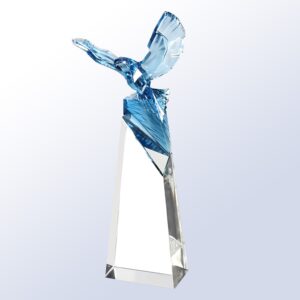 Our Eagle's Triumph Crystal Award features a contemporary blue crystal eagle with it's wings spread wide at the top. It's connected to a clear crystal pillar that is for laser engraving personalization, although this one is blank without engraving. This C2601 crystal eagle award stands 12.25" tall, weighs 5 lbs. & comes packaged in a satin-lined deluxe gift box.