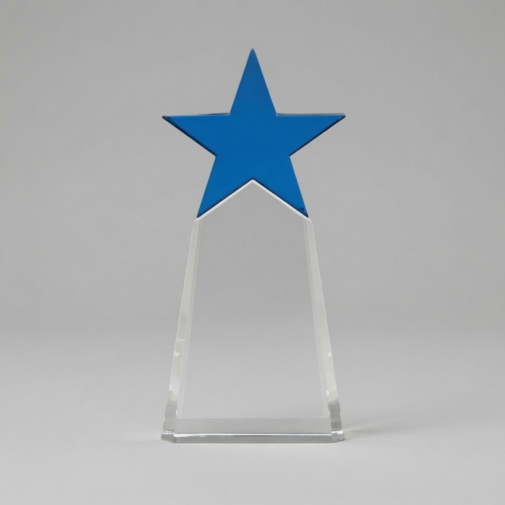 The award features a bold, vibrant blue five-pointed star mounted on top of a tall, clear crystal plaque with a distinctive house or shield-like shape. The front surface of the clear crystal is completely blank and smooth, ready for custom laser engraving or personalization. The trophy is mounted on a thick, clear rectangular base. It is shown from a straight frontal view against a neutral light gray studio background with soft, even lighting that highlights the striking blue star, crystal clarity, and elegant modern design.