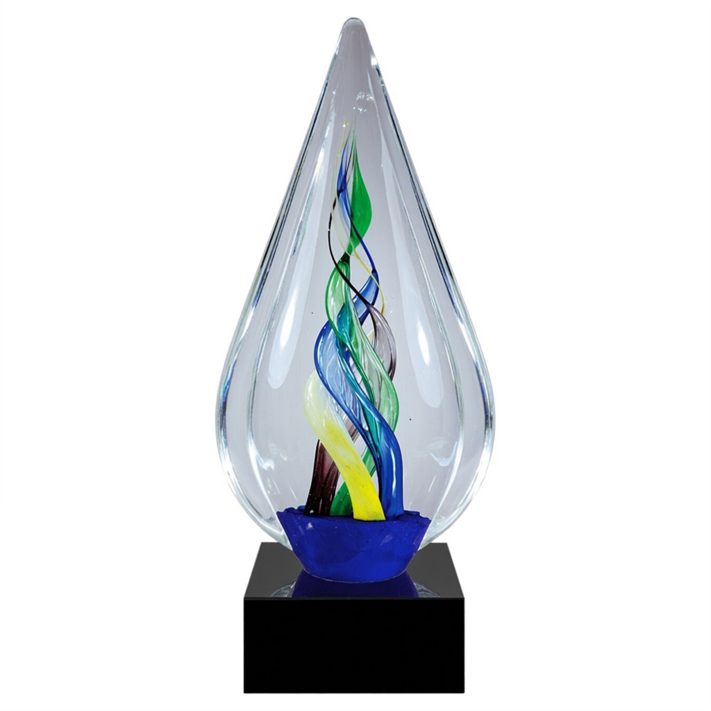 The award features a tall, elegant teardrop-shaped clear hand-blown art glass sculpture with a smooth, polished surface. Inside the crystal, vibrant multicolored glass ribbons in shades of blue, green, yellow, and purple twist gracefully upward in a dynamic spiral pattern, creating a sense of continuous motion. The glass piece is mounted on a solid black square base. The trophy is shown from a straight frontal view against a clean green studio background with even lighting that highlights the transparency of the crystal and the vivid internal colors.