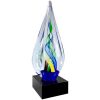 Spire shaped piece of glass with yellow, blue & green colors swirled inside, Mounted on black base, AGS62, 10.5" tall, Weighs 3.6 lbs