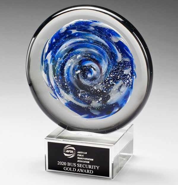 Glass disc with blue, white & black colors inside, mounted on clear glass base, 2294 is 5.75" x 7" size