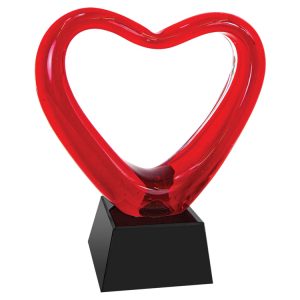 Glass heart made with red colored glass, mounted on black glass base, ags50, 6.5" tall, weighs 3.3 lbs