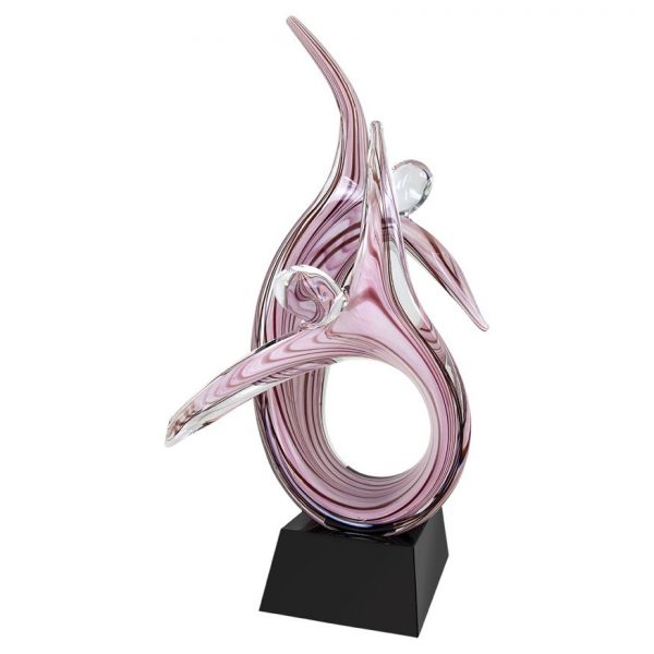 Pink art glass piece with two contemporary people with their hands in the air, mounted on black glass base, ags36, 16.5" tall