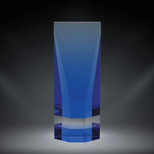 Our Crystal Cobalt Wedge features a 1.5" think piece of crystal with a cobalt hue throughout and a flat surface on the front for engraving. this crystal trophy comes in three sized the 95406 which is 6.5" tall, the 95407 which is 7.25" tall and the 95408 which is 8" tall. This item comes in a satin lined deluxe gift box.