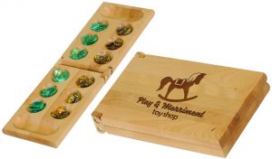 Mancala game board that folds up into a handy carrying case. The front can be personalized with laser engraving or full color process.