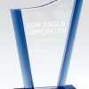 Glass award with curved peak & blue accents on sides & base, CRY860 is 7" tall, weighs 1.8 lbs.