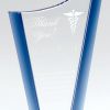 Glass award with a curved peak & blue accents on sides & base, CRY861 is 8" tall, Weighs 2.2 lbs.