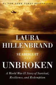Unbroken Book Cover, Written by Laura Hillenbrand, Shows a plain in the sky over the ocean