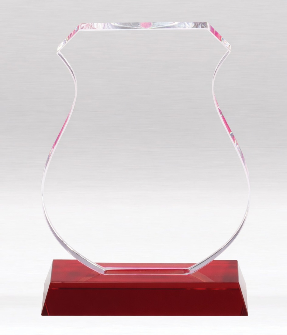 Elegant clear crystal trophy with a graceful curved shield shape and vibrant pink/magenta accents. Mounted on a rich red crystal base, this modern award is perfect for achievement recognition, corporate milestones, and special presentations.