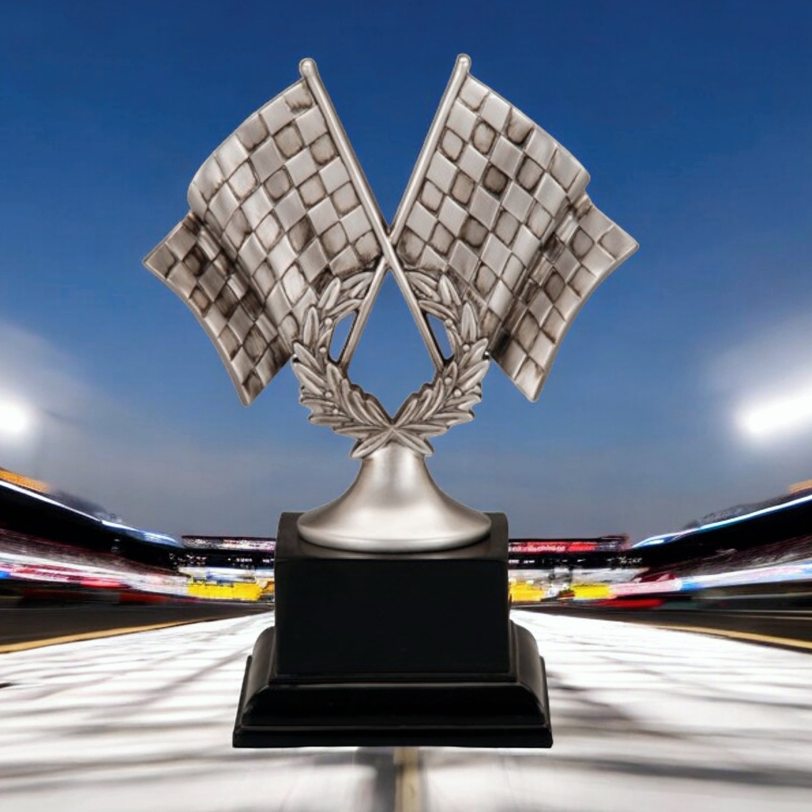 Our Checkered Flag Resin Trophy features 2 silver & black checkered flags and a victory wreath. They're all mounted on a black base that includes a black engraving plate for personalization. This RFA-1078 is 10.25" tall and weighs 3 lbs.