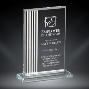 Our Contour Rectangle Glass Award features a rectangle piece of glass with white contour lines on the left and an area on the right for laser engraving personalization. The glass rectangle is mounted on a matching base for added stability. This specific piece is personalized for Kate Shields for being The Employee of the Year. This award comes in 3 sizes to choose from: 75307 is 7", 75308 is 7.75" & 75309 is 8.5" tall. All sizes are packaged in a satin-lined deluxe gift box.